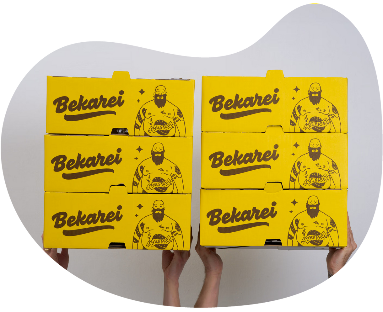An image of people holding stacks of Bekarei boxes above their head.
